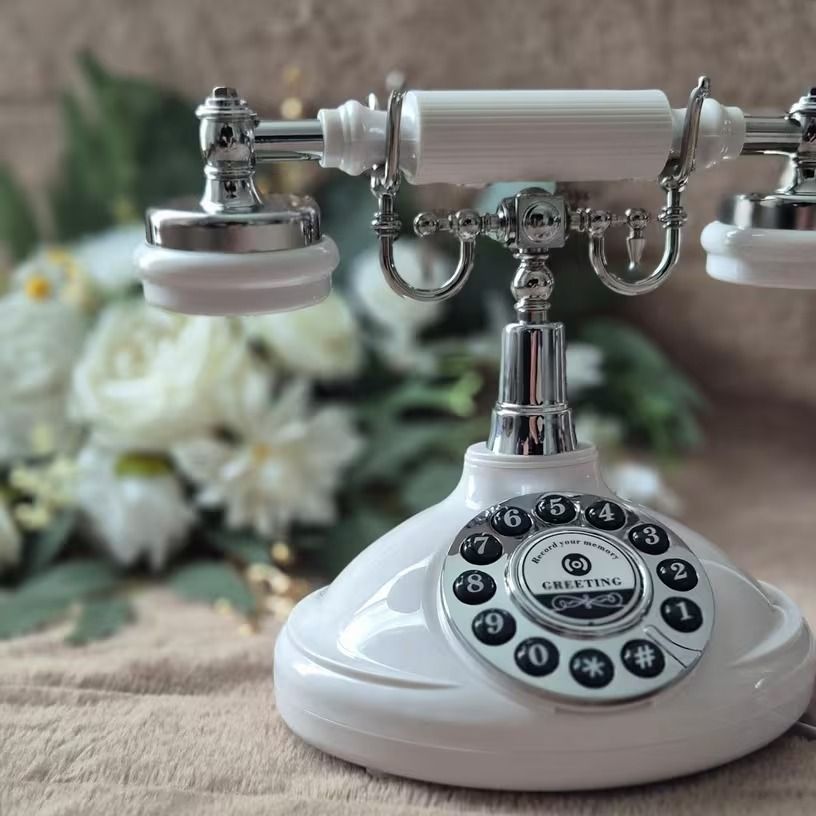 Witte vintage telefoon van het audio gastenboek